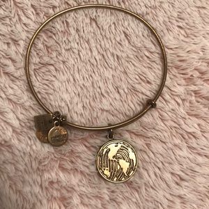 World imprint gold Alex and ani bracelet
